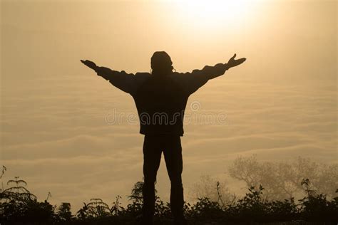 Man Praying At Sunset Mountains Raised Hands Travel Lifestyle Spiritual