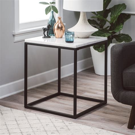 A coffee table is also termed as a cocktail table that's an extended and low table, typically kept in front of a sofa set, allow small talk. Belham Living Sorenson Square End Table with Marble Top ...