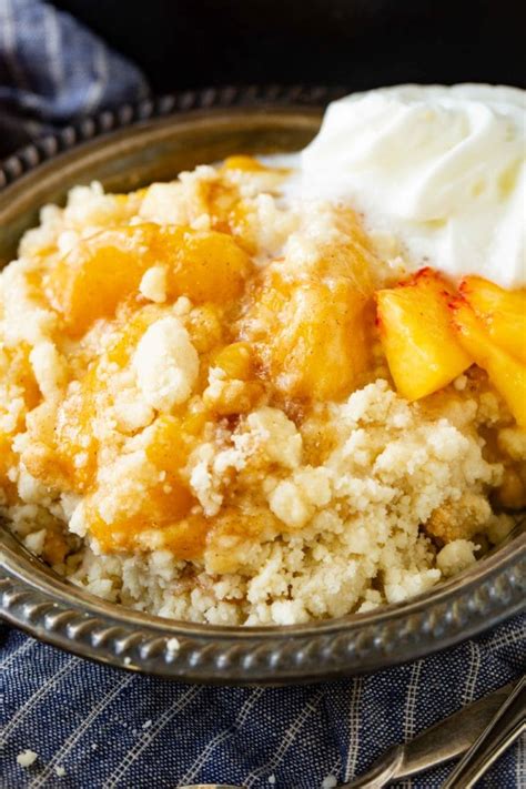 Press down firmly on the cake mix to allow it to begin to absorb the peach juices. Easy Peach Cobbler with Cake Mix - Oh Sweet Basil