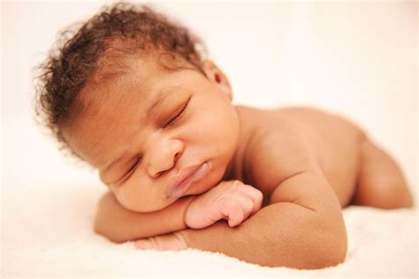 After i've conditioned and detangled her curls, i part her hair in six. Lancaster newborn portraits african american baby ...