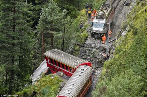 Swiss Landslide Causes Train To Derail Leaving Carriages