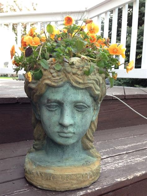 A beautiful handcrafted ceramic flower goddess face planter decorated with 18 handcrafted flowers, leaves and vines. 15 Dazzling DIY Head Planters | Do it yourself ideas and ...