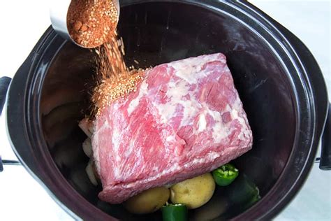 Placing a frozen brisket in a slow cooker is fine, but be sure to add a liquid like beef or vegetable broth to speed up the defrosting process. Slow Cooker Corned Beef - Recipe - Chili Pepper Madness