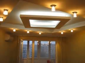 The otherwise basic ceiling pattern has a centre piece in a circular shape. Gypsum Ceiling Designs - Pionare Enterprises Ltd.