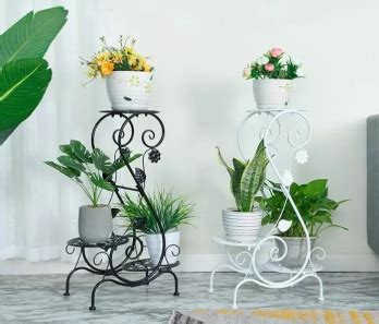 Model rak pot bunga dan tanaman hias unik dari bahan kayu model rak bunga dan tanaman hias bisa terbuat dari bahan apa saja biasanya yang paling banyak dijadikan bahan dasarnya ialah besi. Rak Bunga Besi Unik - Notordinaryblogger