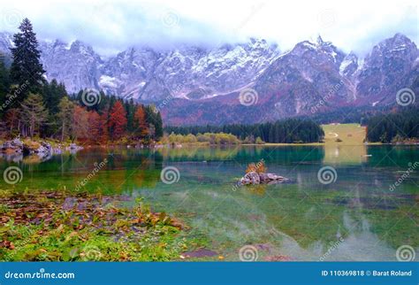 Beautiful Lago Di Fusine Mountain Lake In Autumn And Mangart Mountain