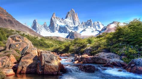 Mountain Stream On A Background Of Sharp Peaks Wallpapers And Images