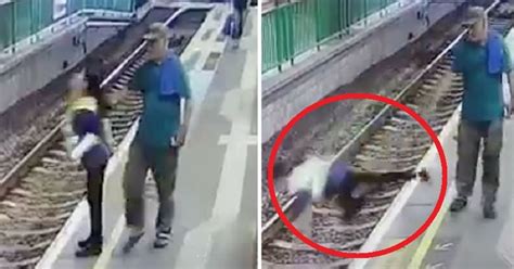 Shocking Footage Shows Man Casually Pushing Woman Onto Railway Tracks For No Reason At All