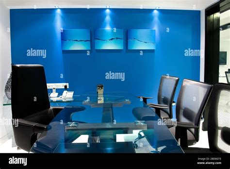 Modern Manager Office Interior With A Blue Walls A Stylish Table