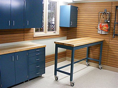 This plan teaches you how to build garage cabinets that are wall mounted, so you can have useful space underneath them for a pegboard or workbench. Garage Blue Color of Garage Shelves Made from Metal ...