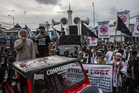 indonesian police village leaders raid homes of suspected lesbians