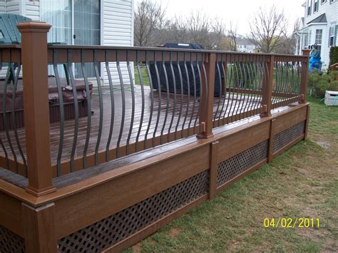 We used preformed metal caps that looked quite nice. Custom Railing in Burlington NJ - Picture 1248 | Decks.com by Trex