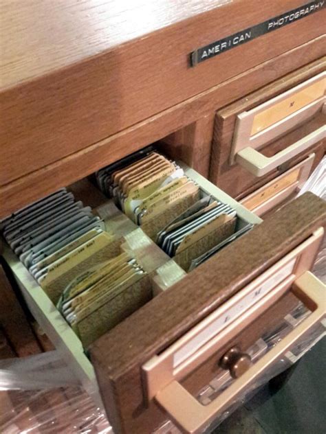 My mom had a spice cabinet on the wall of our kitchen growing that i would hide all sorts of treasures in. iBid Lot # 6801 - 1 each 30 Drawer Card Catalog Cabinet