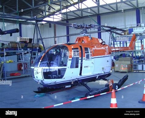 Mbb Bo 105 Helicopter With Registration D Haro In A Hangar At The