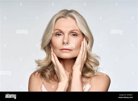 Portrait Of Beautiful 50 Years Old Woman With Perfect Skin Isolated On