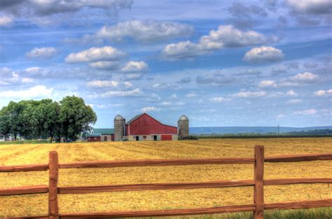 Farmhouse In The Landscape With Clouds In Southern Wisconsin Image