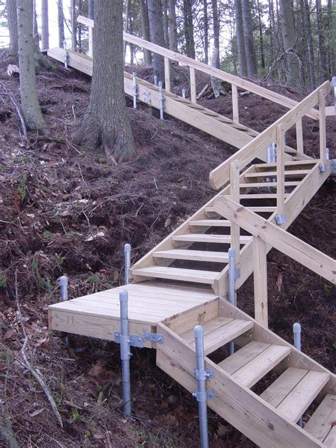 Since we have 12 stairs on this sample staircase, we will divide them in half and have six before the landing and six after. Boardwalks | Outdoor stairs, Garden stairs, Backyard landscaping