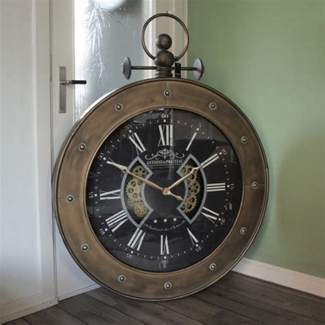 This small antique style wall clock conveys a sense of french flair effortlessly and looks fabulous in any surrounding. tandwiel klok ro Luzern brons 110x141cm | Rimisa sfeer en ...