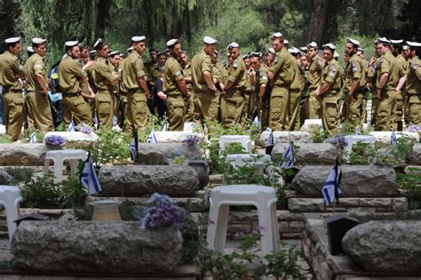 23320 Israeli Flags Being Placed On Graves Of Fallen Soldiers The