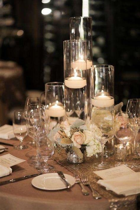 How beautiful are these floating candle centerpieces with flower ! Beautiful Centerpieces Created With Candles | Candle ...