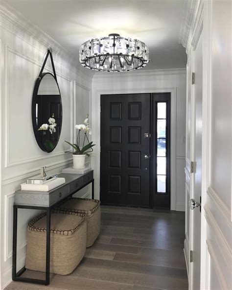 Finding lights that matches your home. and my foyer is finally finished! It took a long time to ...