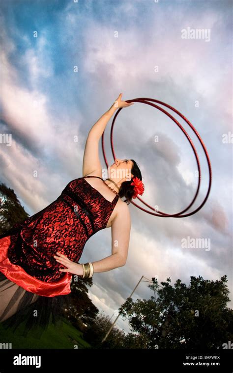 Circus Hula Hoop Performer In The Park Stock Photo Alamy