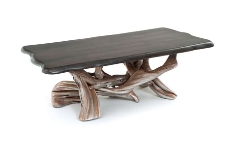 It features all enameled metal construction with racetrack oval top. Organic Modern Coffee Table
