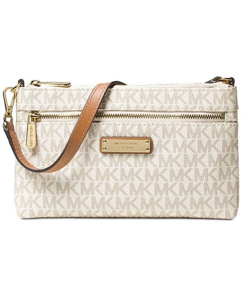 Maybe you would like to learn more about one of these? Michael Kors Signature Jet Set Large Wristlet & Reviews ...
