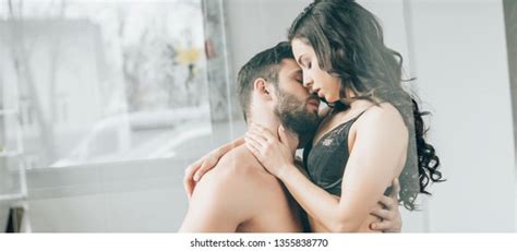 Panoramic Shot Passionate Couple Kissing Home 스톡 사진 1355838770