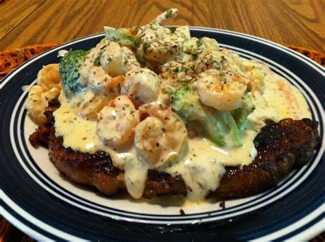 Just some butter, garlic, heavy cream and grated parmesan cheese. Rib eye steak topped with broccoli and shrimp Alfredo ...