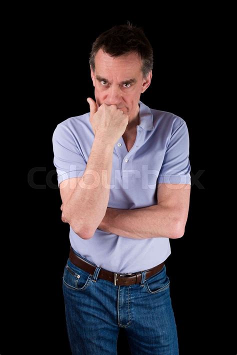 Angry Frowning Man Glaring Over Hand On Chin Stock Image Colourbox