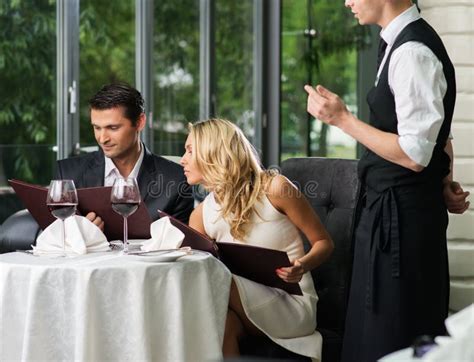 Couple In A Restaurant Making Order Stock Photo Image 47192030