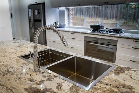 There is a risk that you would reach over the stove to manipulate the window while the stove is on, such as when it rains and you don't want water going into your frying fish. I love the big window over the stove top. The industrial ...