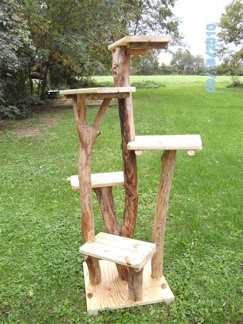 Handmade cat tree play tower get your hands on some plywood for building the base of this homemade cat tree! Cat Tree Kingdom - Outdoor cat trees | Diy cat tree ...