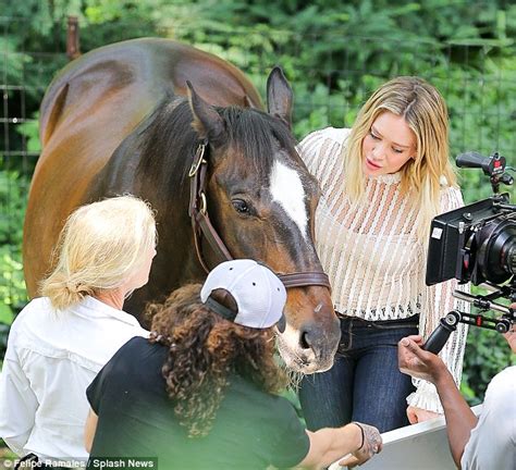 Hilary Duff Whispers In Horses Ear As She Films Latest Scene For Tv