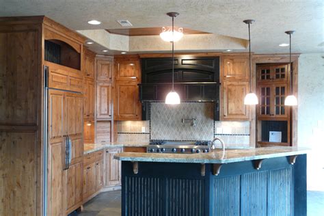 You may choose to mix stained cabinets with a painted island or vice versa. Affordable Custom Cabinets - Showroom