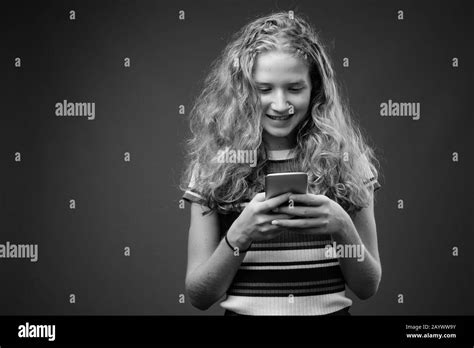 Teenage Girl With Blonde Curly Hair Hi Res Stock Photography And Images