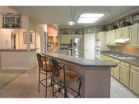 Stately and sophisticated kitchens are modernized with seamless. Black wood Kitchen Cabinets Design ideas