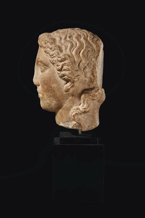 A Greek Marble Head Of Apollo Hellenistic Period Circa 2nd 1st