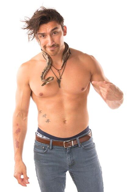 Premium Photo Portrait Of Shirtless Muscular Male Model With Snake On Neck Standing Against