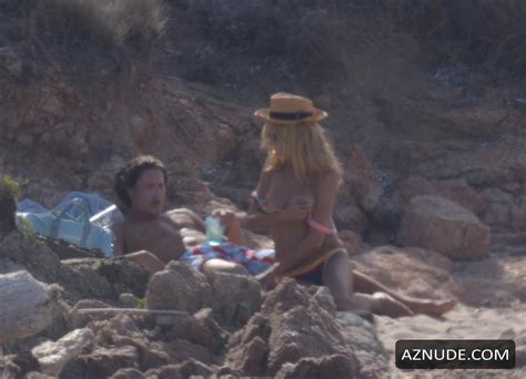 heidi klum topless at a beach in sardinia italy aznude