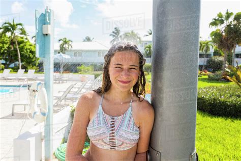 13 Year Old Girl Wearing Bikini Smiling At Camera Stock Photo Dissolve