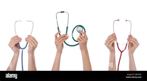 Many Hands With Stethoscopes On White Background Stock Photo Alamy