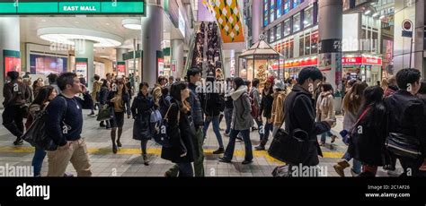 Pedestrian At The Famous Shibuya Scramble Crossing Tokyo Japan At