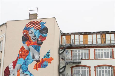 Artist Creates Mural Of 50 Foot Woman On The Side Of A