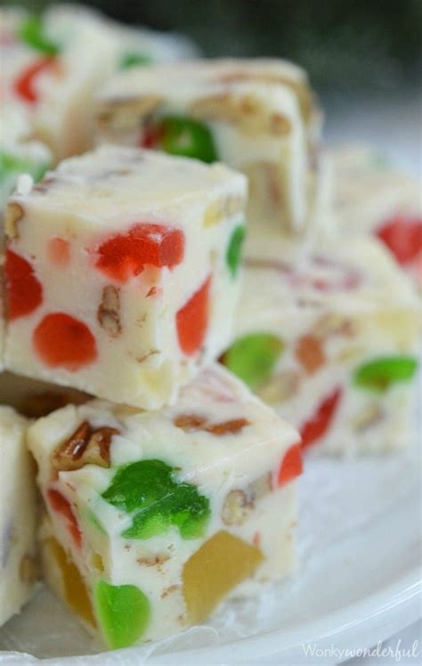 White chocolate candy bars are a lovely combination of melted white chocolate, dried fruits, orange juice and zest, and chopped nuts. Fruitcake White Chocolate Fudge Recipe - WonkyWonderful