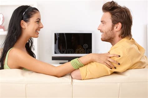 Happy Couple Chatting On Sofa Stock Image Image Of Attractive Cosy