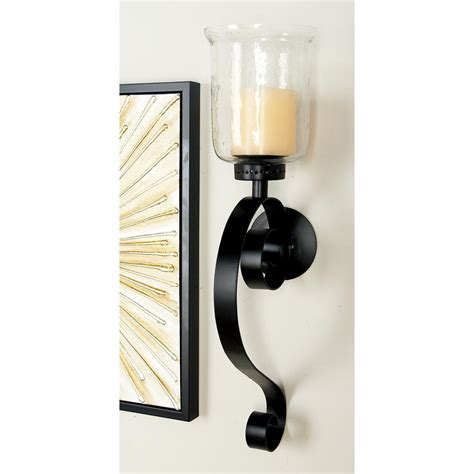 17 tall by 13 wide. Litton Lane 27 in. Wrought Iron Candle Sconce with Glass ...