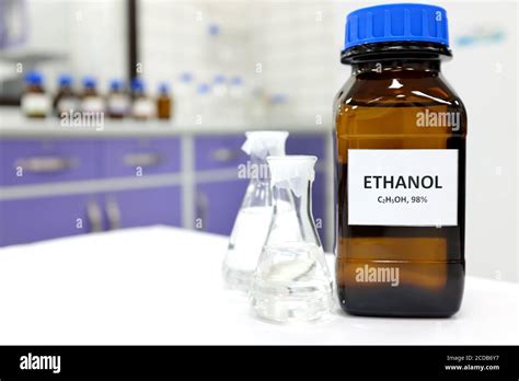 Selective Focus Of Ethanol Or Ethyl Alcohol In Brown Glass Bottle