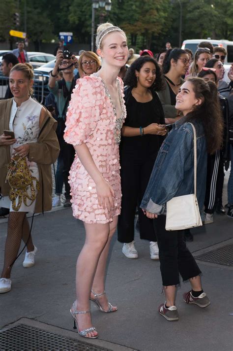 Elle Fanning Arrives At Mui Mui Fashion Show At Paris Fashion Week 2017